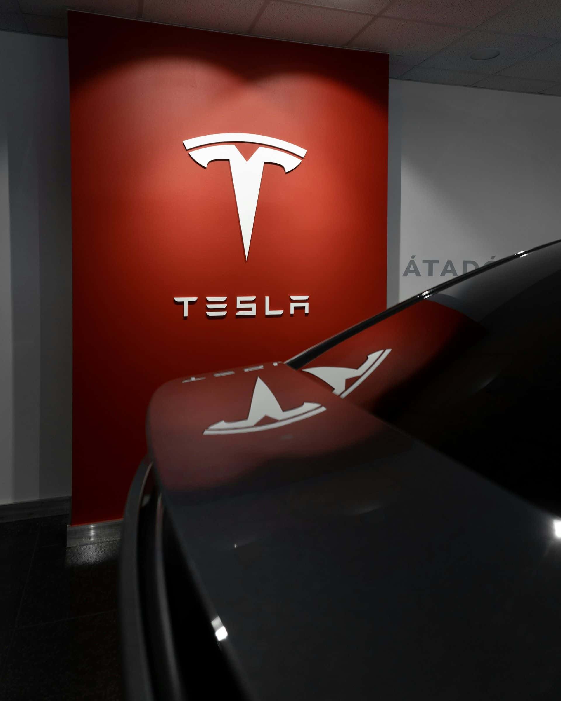 Tesla Logo and Model Y: A Glimpse into the Future of Autonomous Driving.