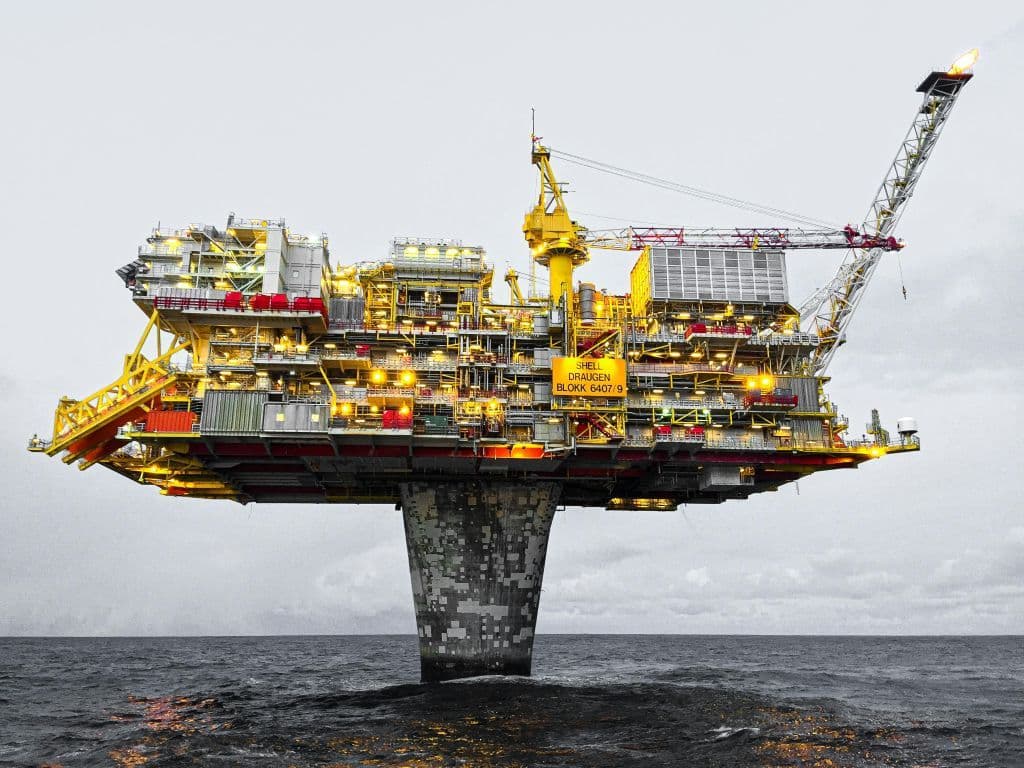 Oil Pump Jack Glows Amid Rising Prices and Global Supply Risks.